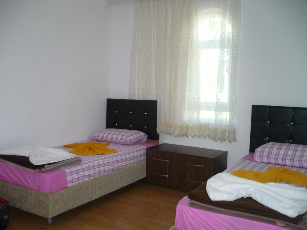 Kiyi Pansiyon Чирали Номер фото