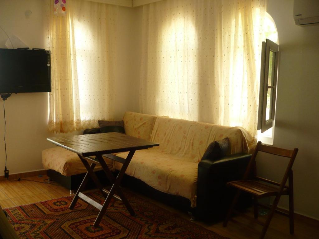 Kiyi Pansiyon Чирали Номер фото
